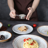 Plato de porcelana con soporte