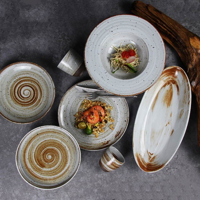 Sistemas hechos a mano del servicio de mesa del restaurante del sistema de cena de la porcelana de la venta caliente del Reino Unido